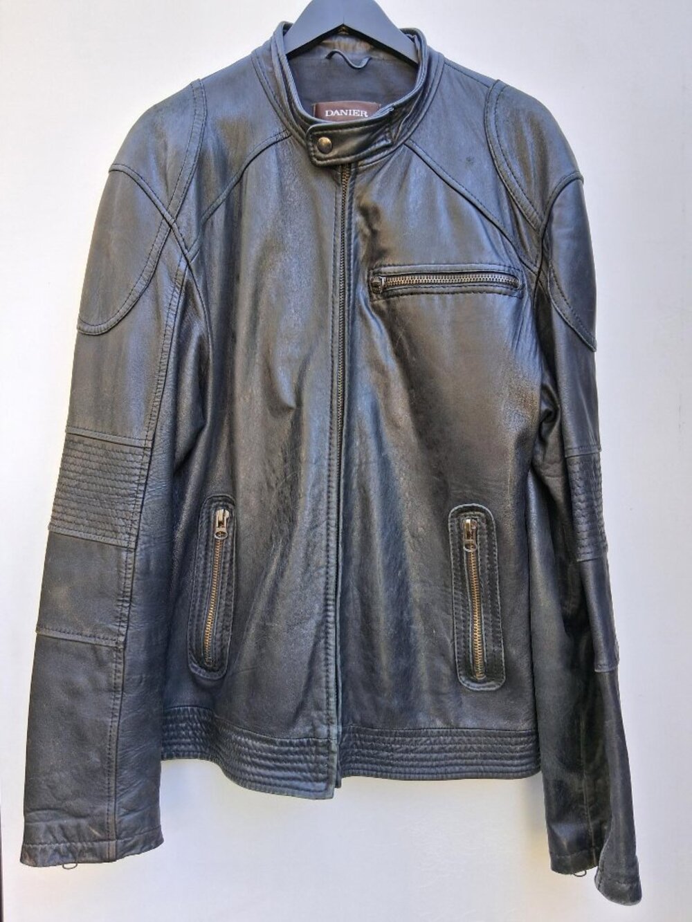 Danier men's leather jacket with quilted sleeve